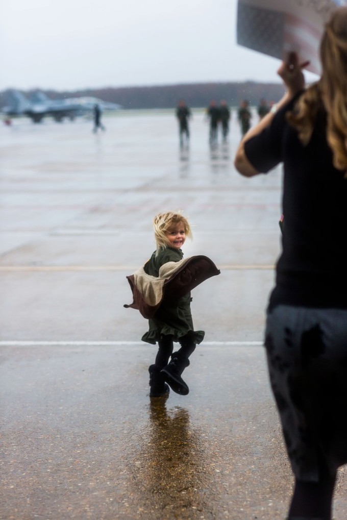 Emotional Rainy Day Navy Pilot Family Homecoming