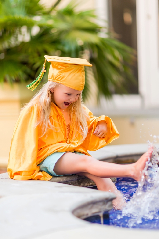 A splashing Preschool Graduation Lifestyle Photography by Brooke Tucker Photography