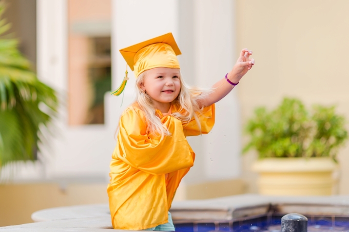 A splashing Preschool Graduation Lifestyle Photography by Brooke Tucker Photography