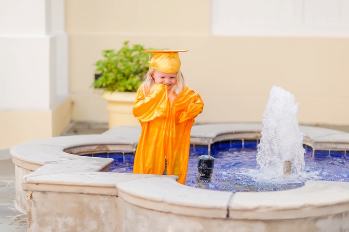 A splashing Preschool Graduation Lifestyle Photography by Brooke Tucker Photography