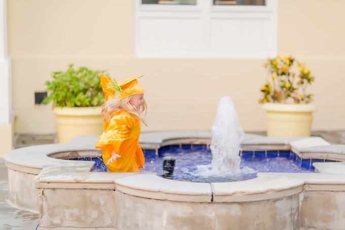 A splashing Preschool Graduation Lifestyle Photography by Brooke Tucker Photography