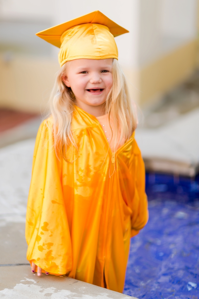 A splashing Preschool Graduation Lifestyle Photography by Brooke Tucker Photography